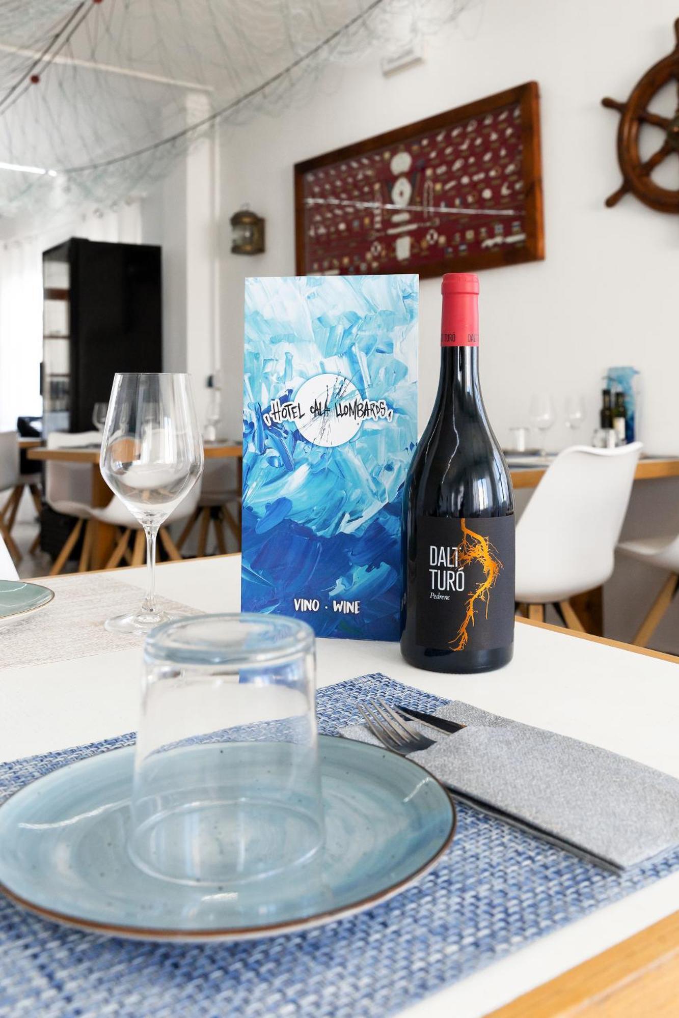 Hostal Cala Llombards Bagian luar foto